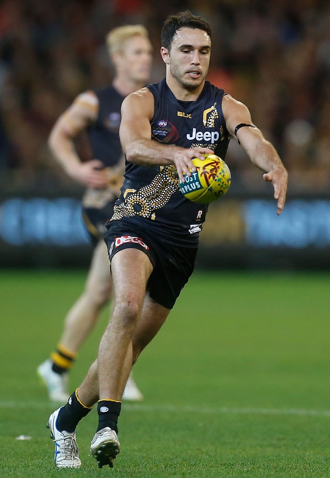 AFL 2015 Rd 09 - Richmond v Essendon Shane Edwards of the Tigers kicks the ball during the 2015 AFL Round 09 Dreamtime at the G match between Richmond Tigers and the Essendon Bombers at the MCG, Melbourne on May 30, 2015. (Photo: Adam Trafford/AFL Media)